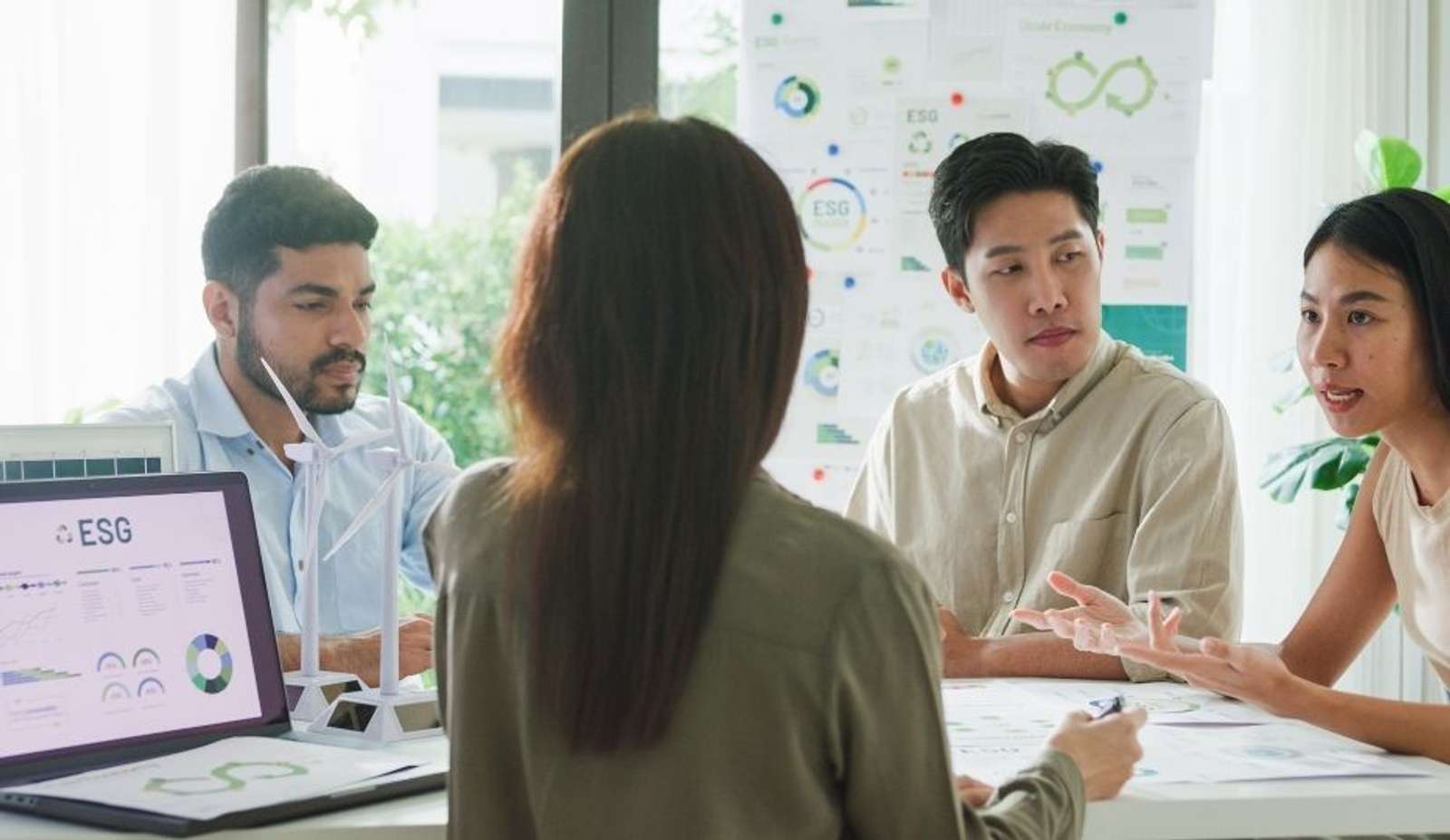 Business Team Discussing ESG Strategy in Office